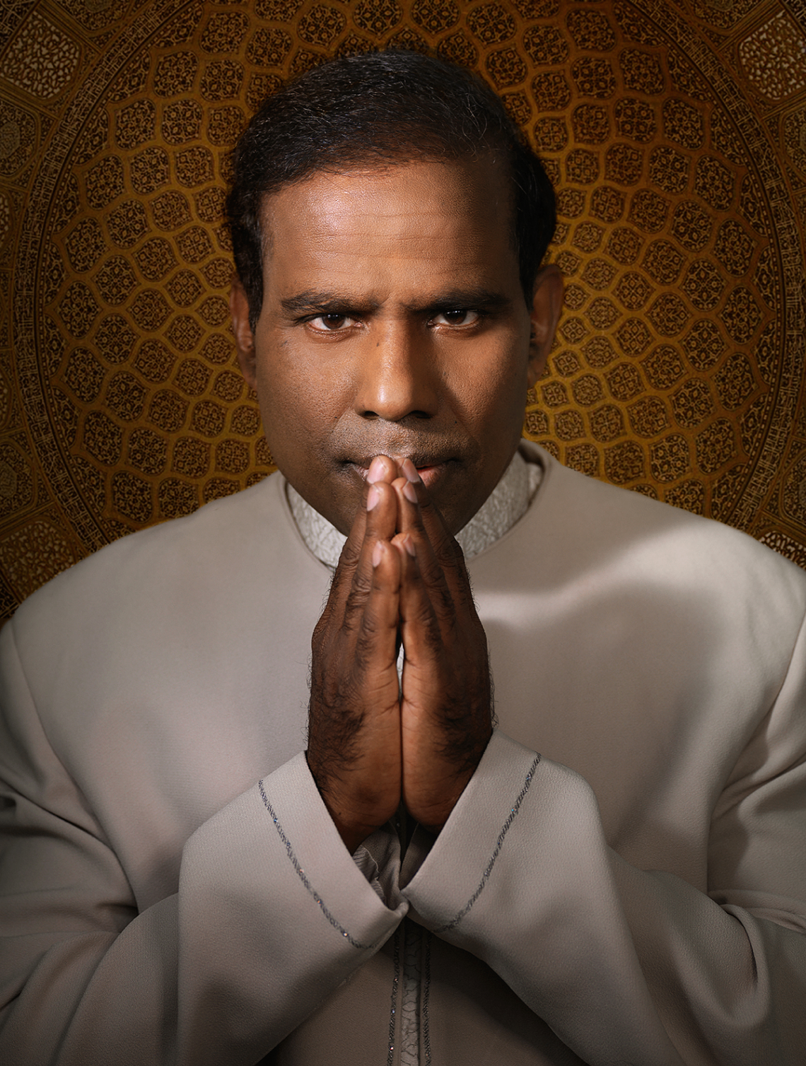 Dr. K.A. Paul with hands folded in namaste