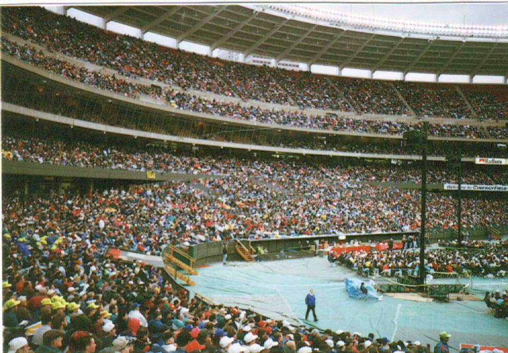Dr. K.A. Paul preaching to a packed stadium crowd